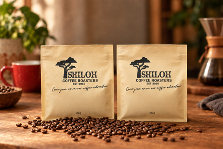 Two Shiloh Coffee Roasters 250g pouches, one for each of the two monthly coffees in The Voyager Subscription